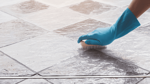 scrubbing tile floors