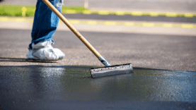 seal coating commercial summer parking lot maintenance